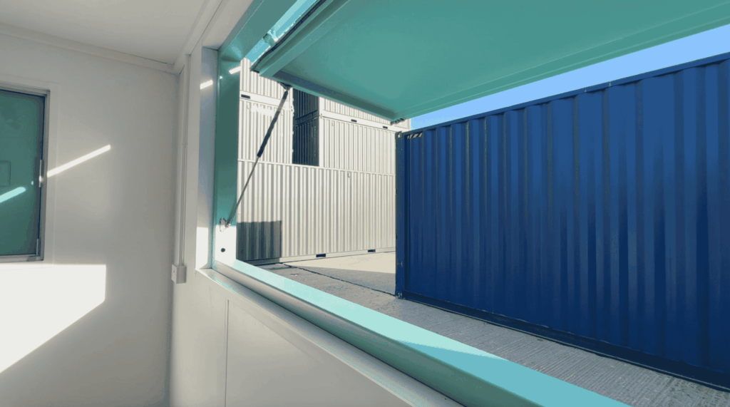 Converted shipping container coffee shop serving hatch