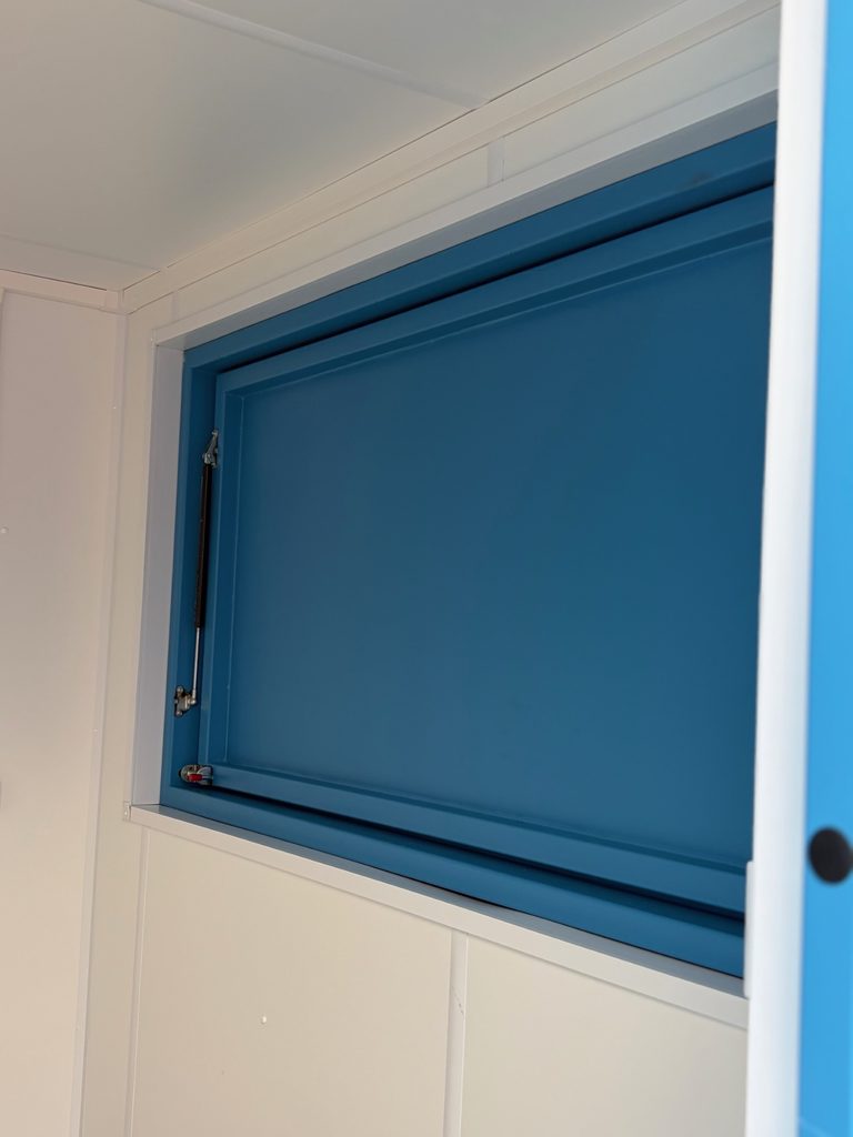 Catering window from inside the custom-built catering unit